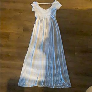 Long blue dress with white stripes.